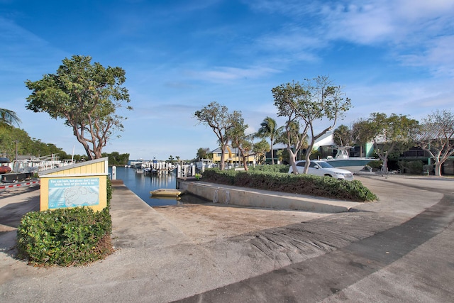 view of community with a water view