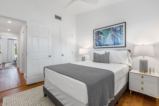 bedroom featuring dark wood-type flooring