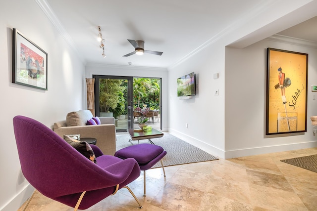 interior space with ceiling fan, ornamental molding, and track lighting