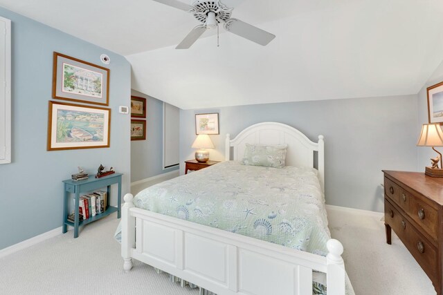33 Pen Key Dr, Islamorada, FL 33036 - bedroom with lofted ceiling, light carpet, and ceiling fan