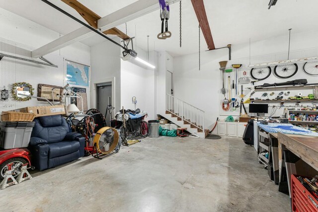 33 Pen Key Dr, Islamorada, FL 33036 - garage with a garage door opener and a workshop area