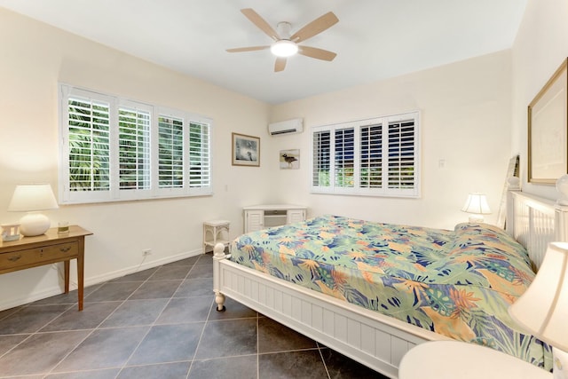 33 Pen Key Dr, Islamorada, FL 33036 - bedroom featuring dark tile patterned flooring, an AC wall unit, and ceiling fan