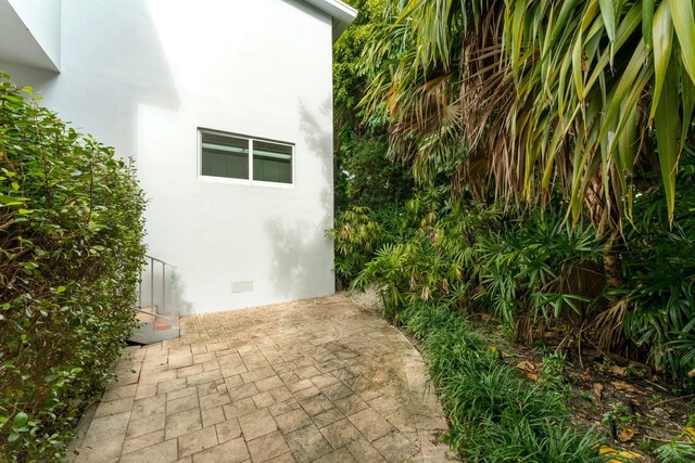 33 Pen Key Dr, Islamorada, FL 33036 - view of side of home with a patio area