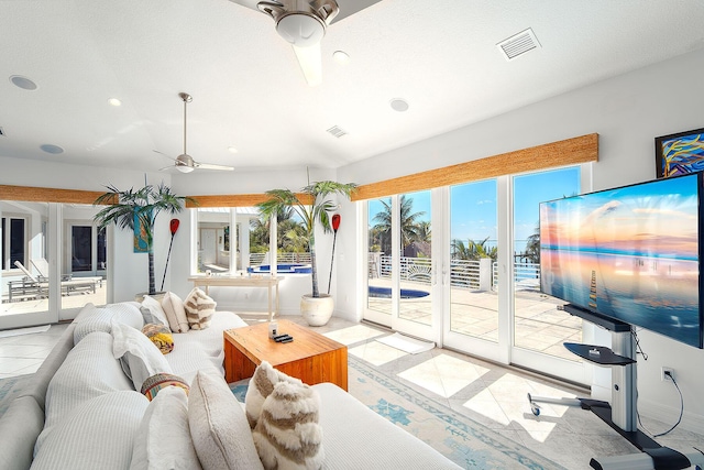 living room with ceiling fan