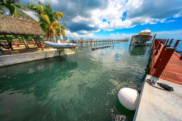 view of dock with a water view