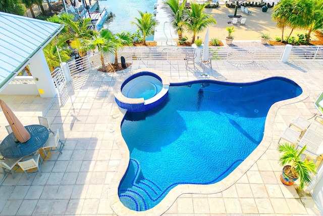 view of swimming pool featuring an in ground hot tub, a gazebo, and a patio