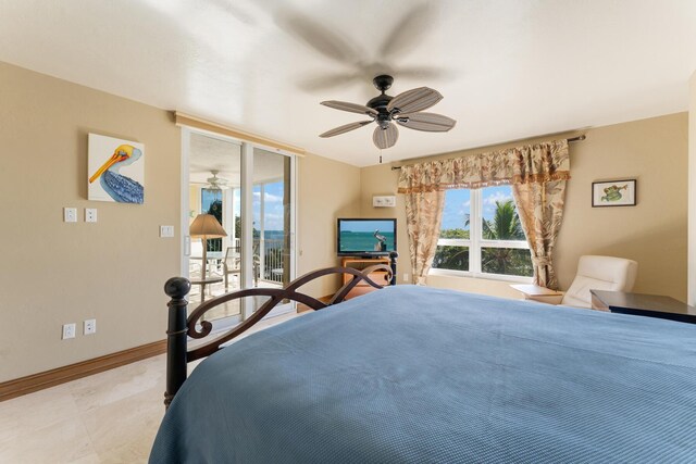 bedroom with ceiling fan and access to exterior