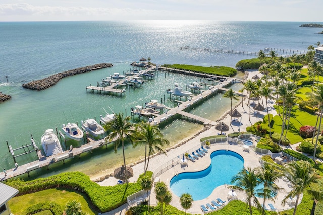 birds eye view of property with a water view