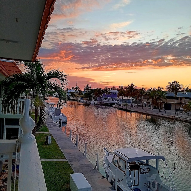 property view of water featuring a boat dock