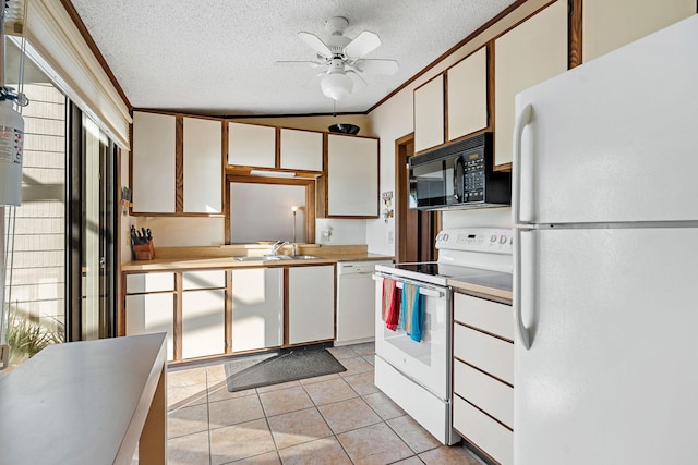 kitchen with white cabinetry, sink, white appliances, and ornamental molding