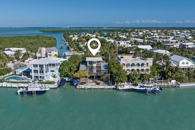 drone / aerial view featuring a water view