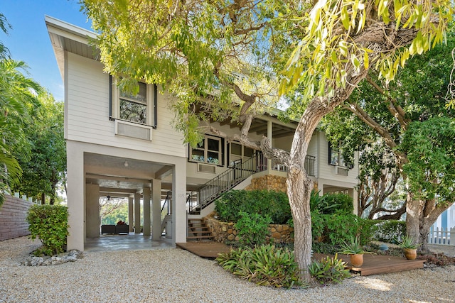 view of front of property with a carport