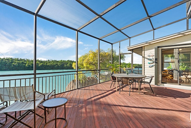 sunroom with a water view