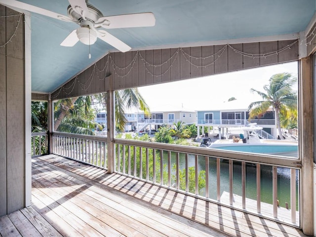 wooden deck featuring ceiling fan