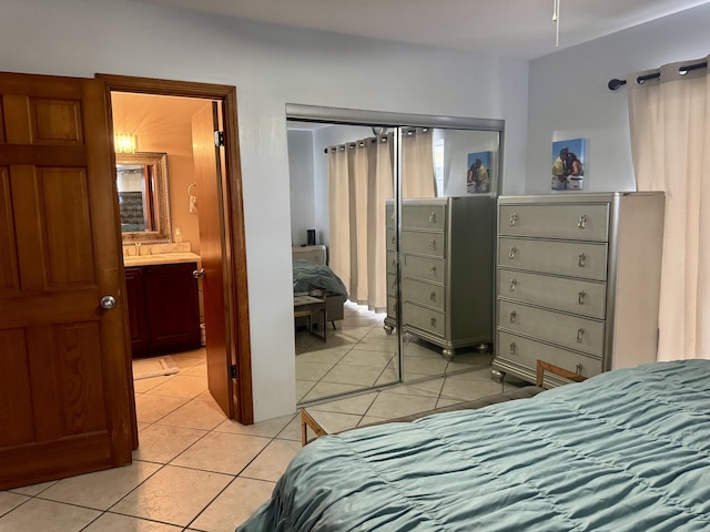 27821 Leeward S Rd, Little Torch, FL 33042 - bedroom with light tile patterned flooring and connected bathroom
