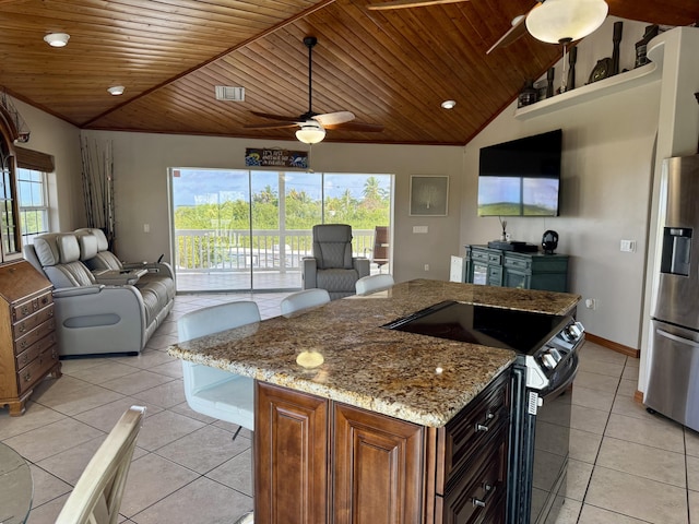 27821 Leeward S Rd, Little Torch, FL 33042 - kitchen with appliances with stainless steel finishes, wood ceiling, light tile patterned flooring, a ceiling fan, and lofted ceiling