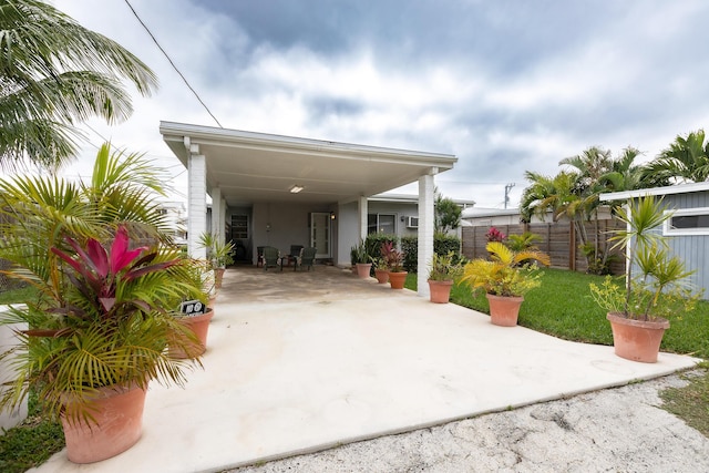 view of patio / terrace with a carport