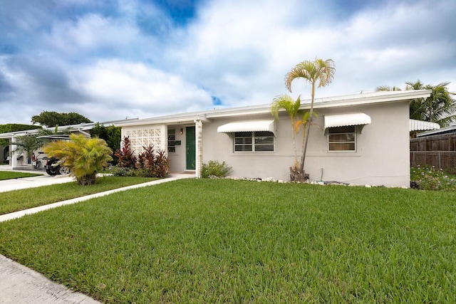 view of front of house with a front yard