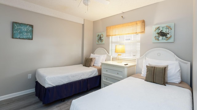 bedroom featuring dark hardwood / wood-style flooring