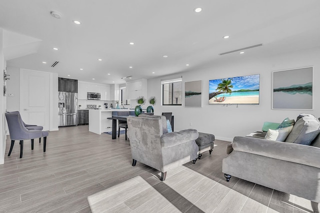 living room with light wood-type flooring