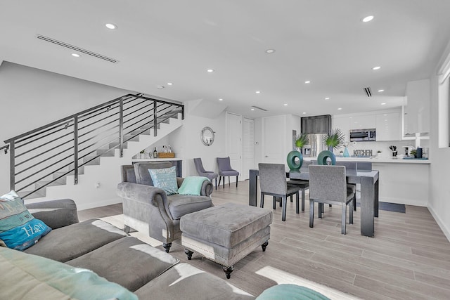 living room with light wood-type flooring