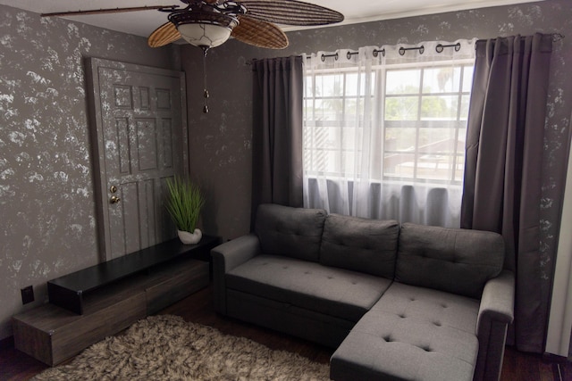 3355 Flagler Ave, Key West, FL 33040 - living area featuring wallpapered walls, a ceiling fan, and wood finished floors