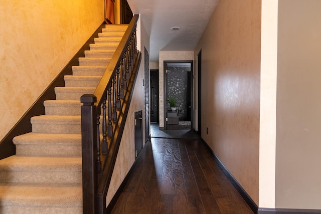 3355 Flagler Ave, Key West, FL 33040 - stairway featuring hardwood / wood-style floors and baseboards