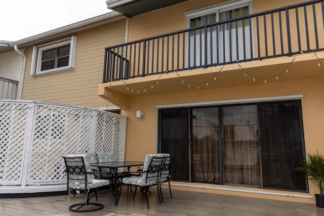 3355 Flagler Ave, Key West, FL 33040 - wooden terrace with outdoor dining area