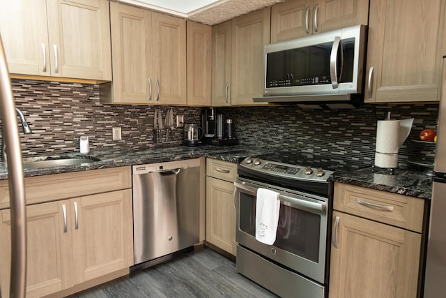 3355 Flagler Ave, Key West, FL 33040 - kitchen with stainless steel appliances, a sink, tasteful backsplash, dark wood-style floors, and light brown cabinetry