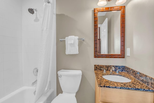 full bathroom with vanity, toilet, and shower / bath combo