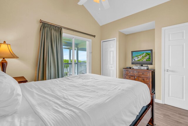 bedroom with lofted ceiling, access to outside, ceiling fan, light hardwood / wood-style floors, and a closet