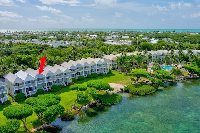 birds eye view of property featuring a water view