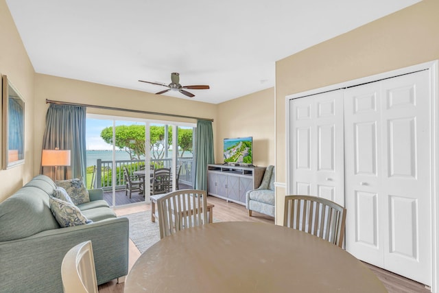 dining area featuring hardwood / wood-style flooring and ceiling fan