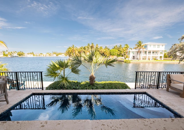 33 Cypress Ave, Key Haven, FL 33040 - swimming pool featuring a water view