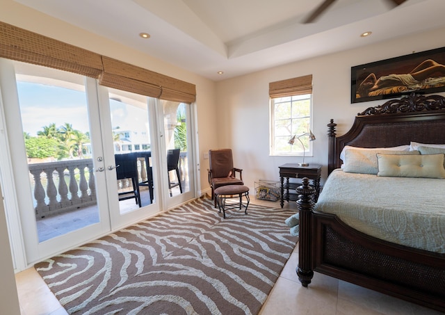 33 Cypress Ave, Key Haven, FL 33040 - carpeted bedroom featuring access to exterior, recessed lighting, french doors, and a tray ceiling