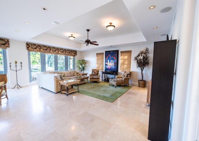 33 Cypress Ave, Key Haven, FL 33040 - living area with a tray ceiling, a ceiling fan, light tile patterned floors, and recessed lighting