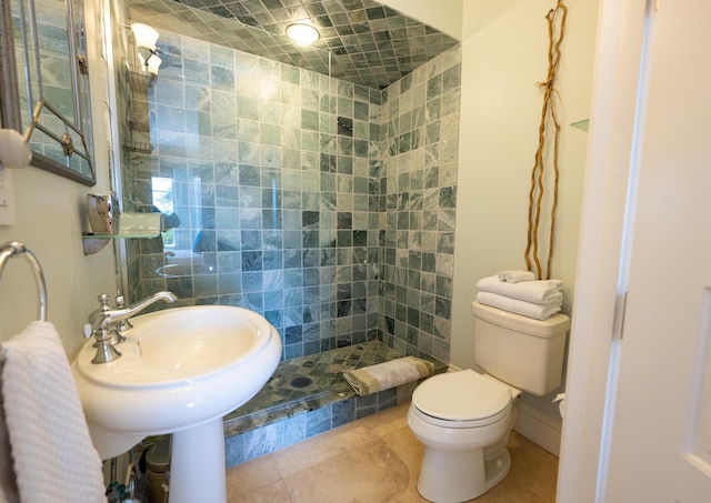 33 Cypress Ave, Key Haven, FL 33040 - bathroom featuring tile patterned floors and a tile shower
