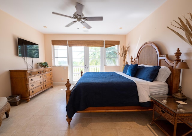 33 Cypress Ave, Key Haven, FL 33040 - bedroom featuring access to exterior, light tile patterned flooring, and a ceiling fan