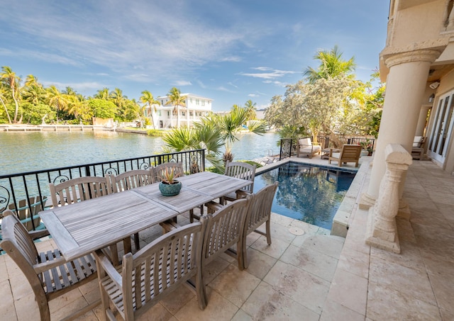 33 Cypress Ave, Key Haven, FL 33040 - swimming pool featuring outdoor dining area and a water view