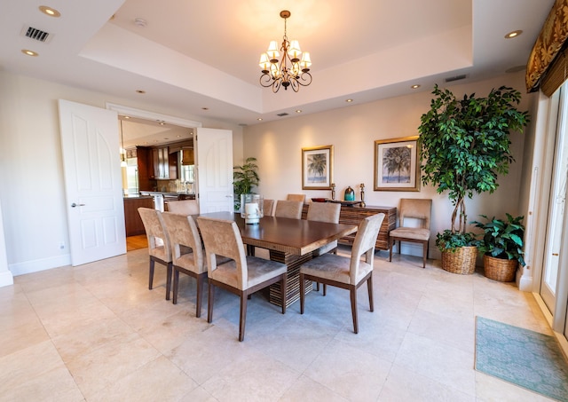 33 Cypress Ave, Key Haven, FL 33040 - dining area with a chandelier, a tray ceiling, plenty of natural light, and recessed lighting