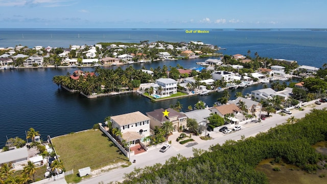 33 Cypress Ave, Key Haven, FL 33040 - aerial view of residential area featuring a large body of water