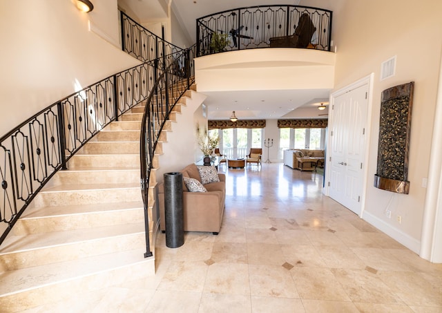 33 Cypress Ave, Key Haven, FL 33040 - stairs featuring a high ceiling and baseboards