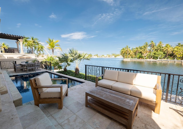 33 Cypress Ave, Key Haven, FL 33040 - view of patio with outdoor lounge area, a water view, outdoor dining area, and an outdoor pool