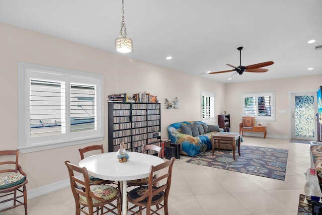 dining area with light tile patterned floors, recessed lighting, baseboards, and ceiling fan