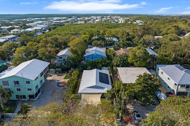 aerial view featuring a forest view