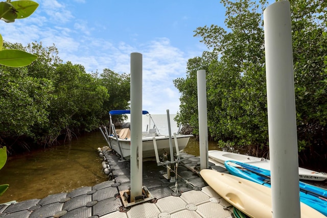 view of patio featuring a dock