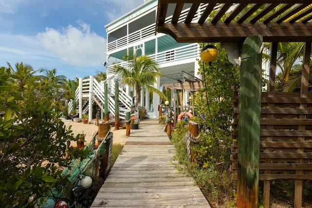 view of home's community featuring a pergola