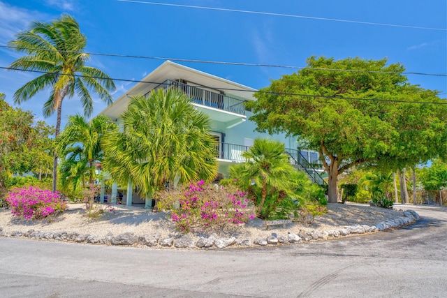 12690 Overseas Hwy Unit 52, Marathon, FL 33050 - view of side of property featuring a balcony and stucco siding