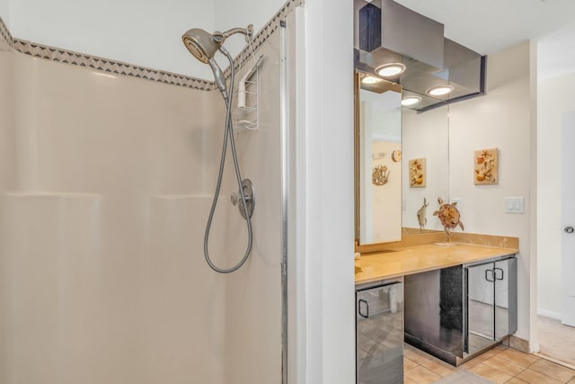 12690 Overseas Hwy Unit 52, Marathon, FL 33050 - full bathroom with baseboards, tile patterned flooring, a shower, and vanity
