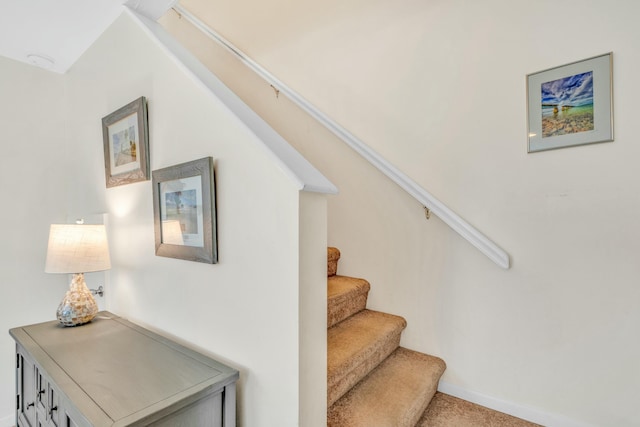 12690 Overseas Hwy Unit 52, Marathon, FL 33050 - staircase with baseboards and carpet